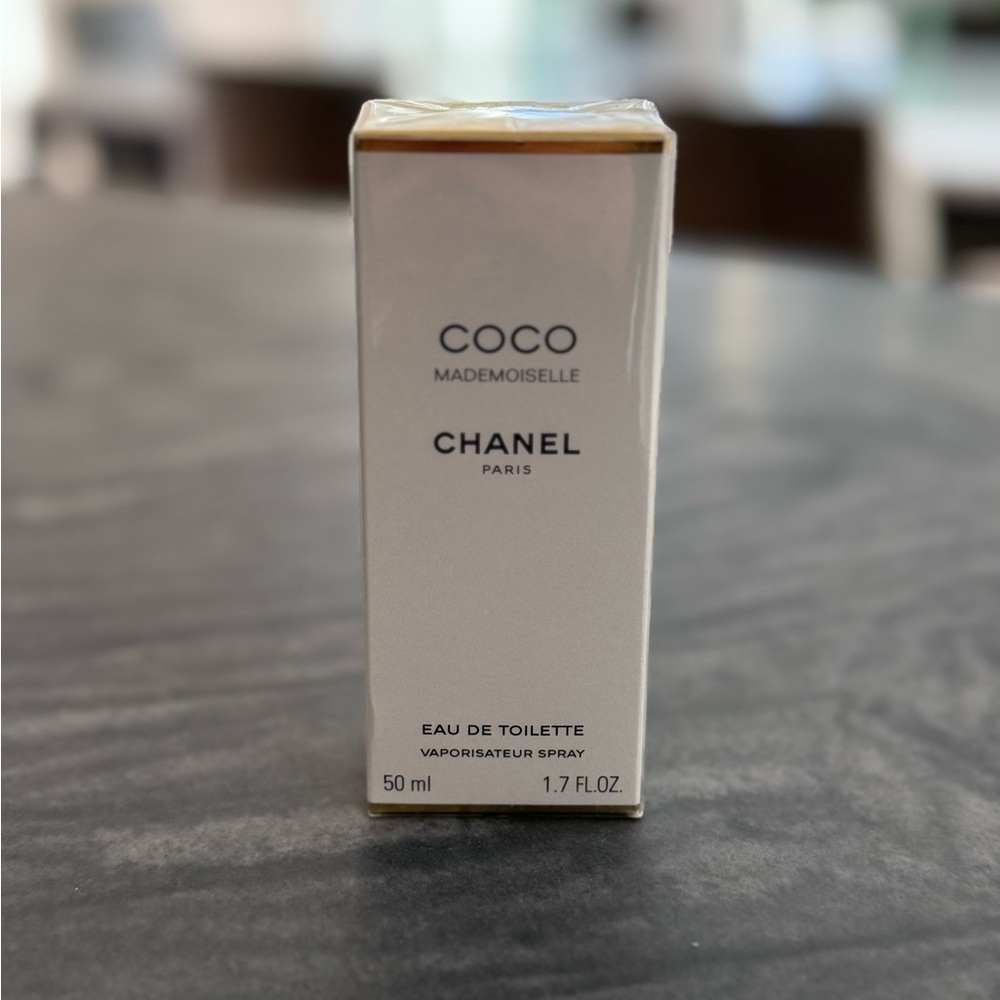 Coco Chanel Fragrance with Gold and White Design